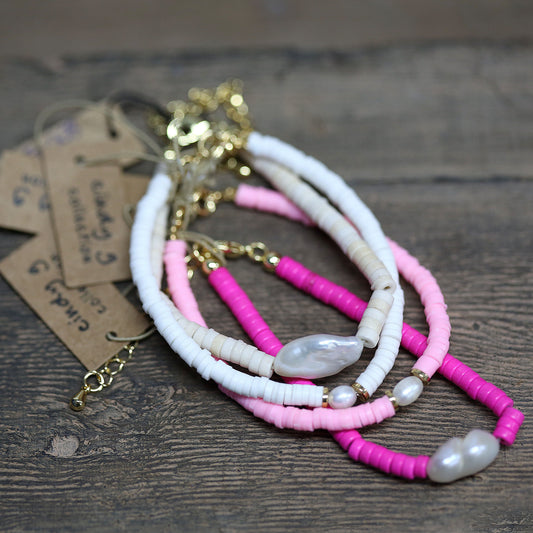 Bright pink bead bracelet with fresh water pearl and gold plated clasp